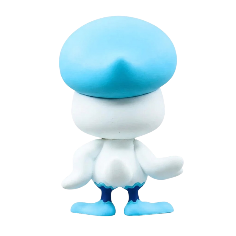 Figurine Coiffeton Pokémon avec son corps blanc et sa coiffure bleue caractéristique.