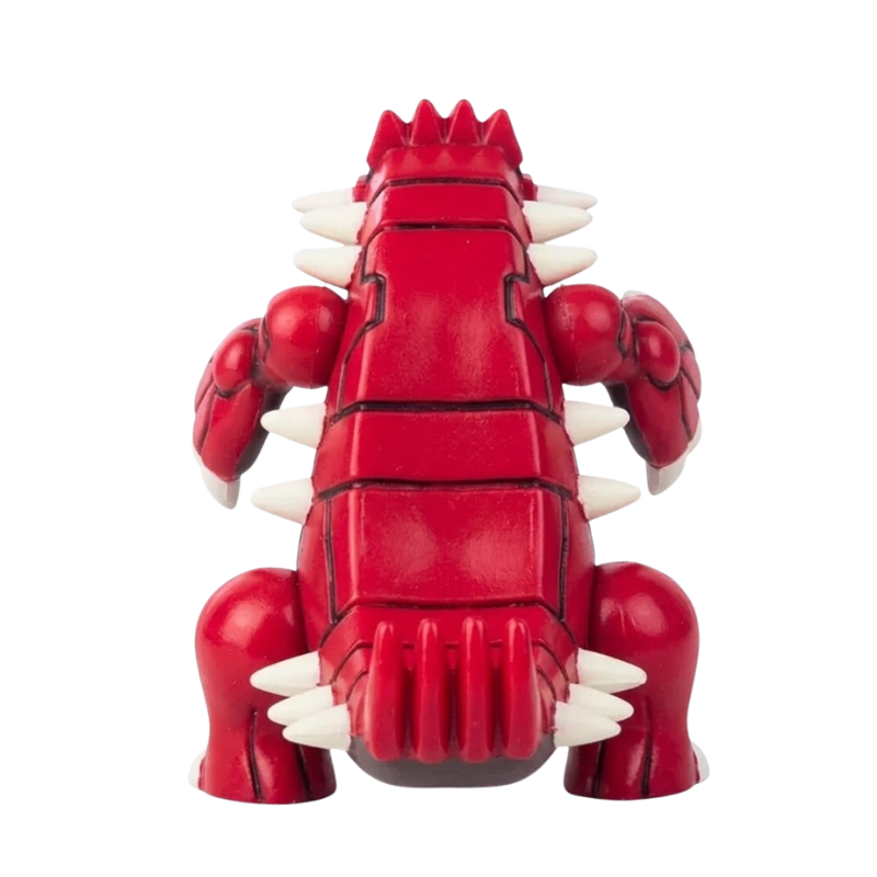 Figura Pokémon que representa a Groudon en una pose imponente.