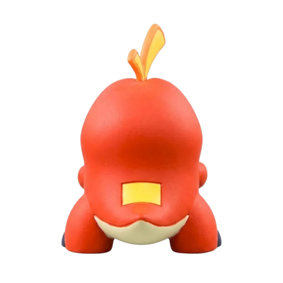 Figurine Chochodile avec ses petites pattes, sa queue courte et son apparence de crocodile de feu.