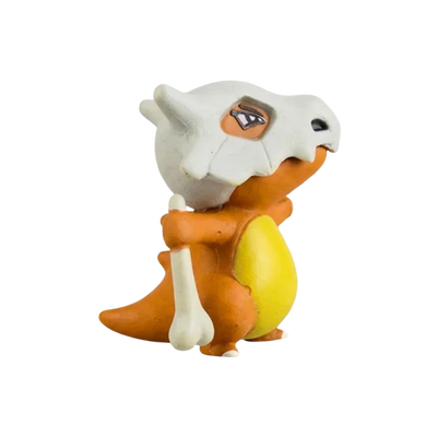 Figurine Osselait Pokémon avec son corps marron et son casque osseux caractéristique