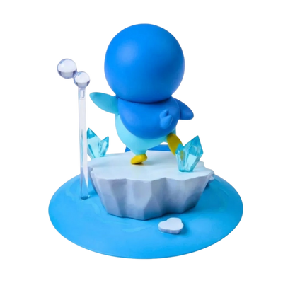 Figurine décorative Tiplouf avec ses grands yeux expressifs et son apparence mignonne.