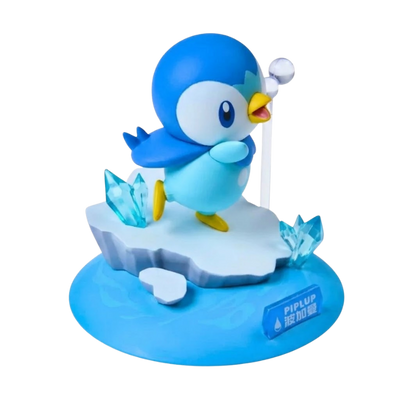 Figurine Tiplouf Pokémon avec son corps bleu et son petit bec jaune caractéristique.